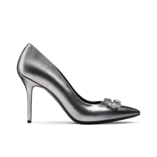 Silver pumps with a brooch