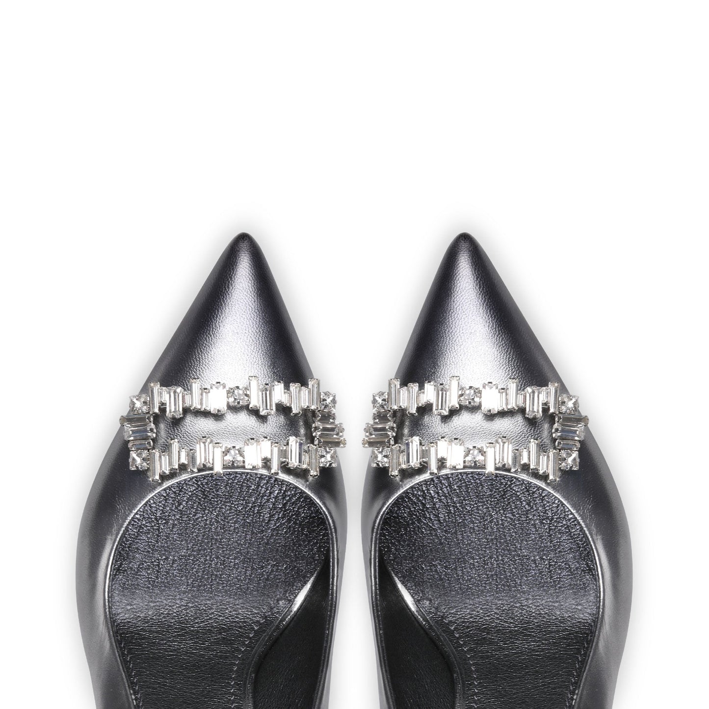 Silver pumps with a brooch