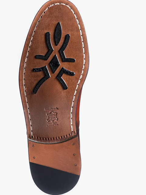 Sneakers have a sleek, patina leather look